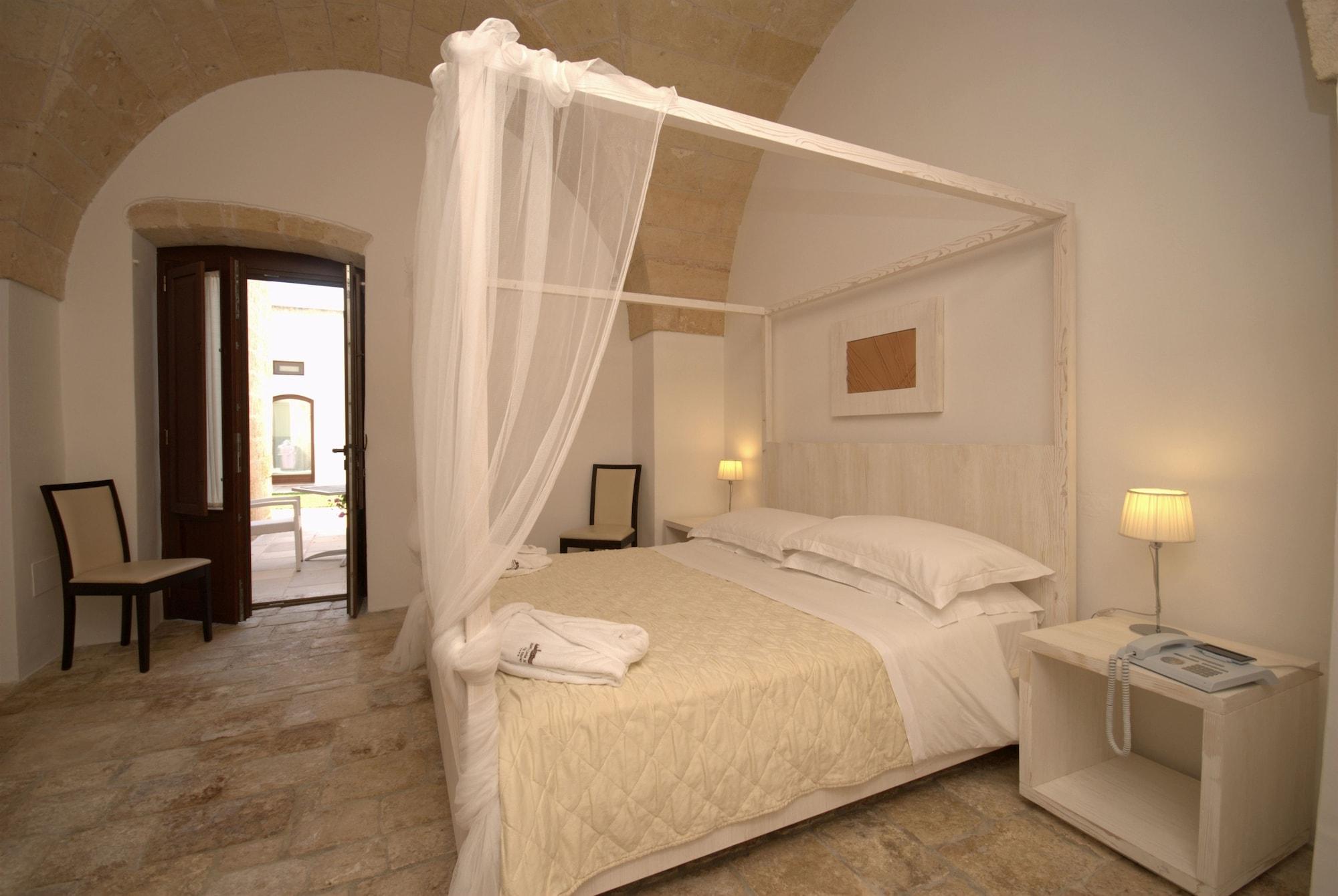 Masseria Corda Di Lana Hotel & Resort Торре-Лапилло Экстерьер фото